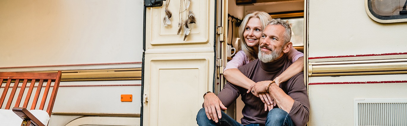 Couple sitting on RV